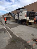 Remise en état d'une voirie en enrobé, à Plan de Campagne