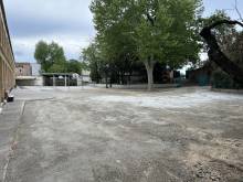 Création d'une cour en enrobé drainant noir à Marseille